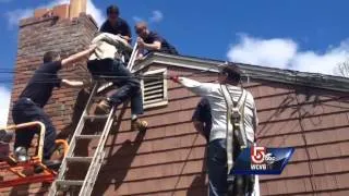 Man falls from ladder, gets entangled in power line