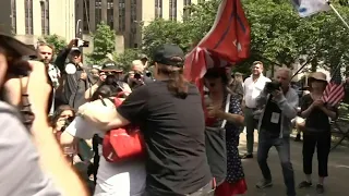 Pro- and anti-Trump protesters scuffle outside court as jury deliberates | AFP