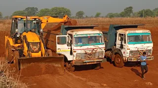 jcb 3dx backhoe fully loading red mud in tata 2518 ex truck  and tata haywa