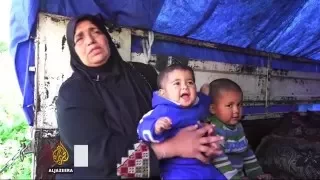 Three-way fight in Syria's Deraa traps fleeing civilians