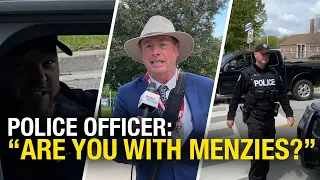 Citizen journalist harassed by officer who demands to know if he's working with… David Menzies?!