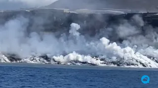 Large smoke plumes and lava "delta" in the waters off La Palma, Spain