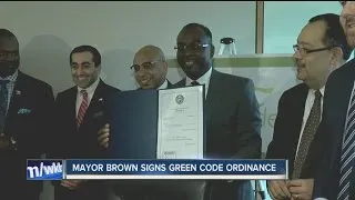 Buffalo Mayor Byron Brown signs "Green Code"