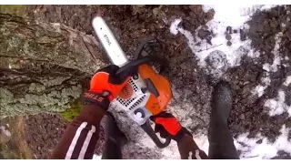 Stihl MS211 chainsaw action from first-person view