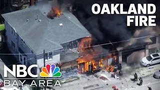 Watch: Firefighters battle structure fire in Oakland