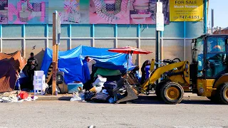 Homeless Sweep Left Woman with Only a Backpack