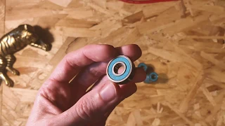 How to remove/'pop' skateboard bearing covers