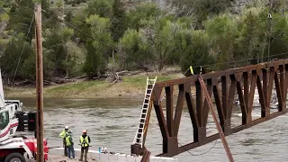 Construction crews install major component of new Carbella Bridge