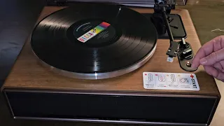 step-by-step instructional guide on assembling the 1 by ONE High Fidelity Belt Drive Turntable