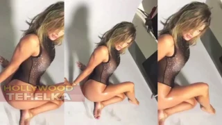 Khloe Kardashian Flaunts Butt In  Sheer Thong Bodysuit & Looks Amazing