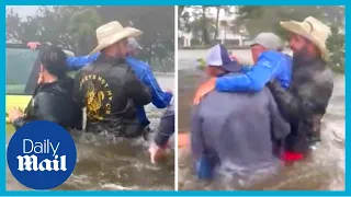 Hurricane Ian: Good Samaritans rescue elderly man from flooded car