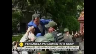 Scuffle Outside Venezuela Parliament, Guaido tries to scale fence