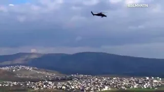 Turkish made attack helicopter firing at terrorists in Syria.