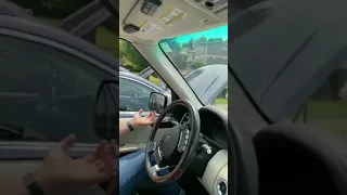 Men reacting to women trying to fix a car
