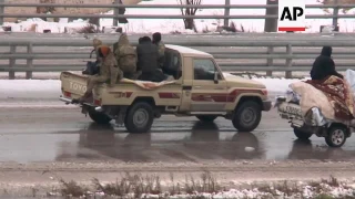 Raw: Rebels Leave Eastern Aleppo