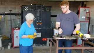 Glass blowing paperweight on oregon coast