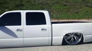 Bagged GMC Crew Cab on big billet wheels