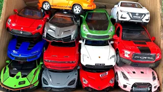 Box Full of Model Cars -Lamborghini Scv12, Porsche Taycan, Lamborghini Svj, Porsche 964, GTR R35