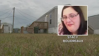 Woman killed after stray bullet entered her home