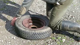 Break or crack the bead on a tyre with a piece of angle iron