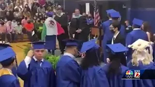 Student denied diploma over flag at graduation