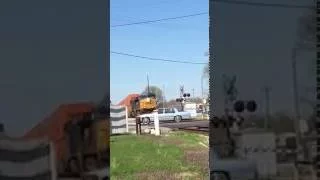 Idiot Crossing Right In Front Of CSX Locomotive.