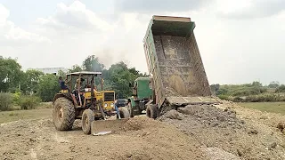 The Dump Truck reloading the land. Excavator, Dump Truck, and bulldozer