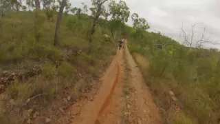 TE510 chasing KX450 on old mining trails.