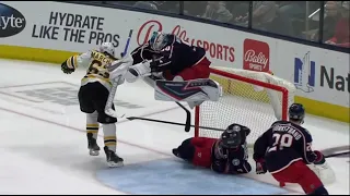 Elvis Merzļikins jumped gracefully to avoid Zach Werenski crashing into him