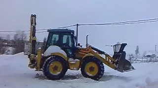 NEW HOLLAND LB115.B - backhoe snow drift