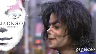 Michael Jackson waving to the fans. Invincible Signing Event  2001