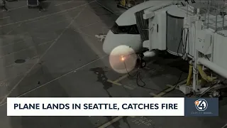 Plane lands in Seattle, catches fire