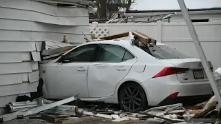 Car drives through home on Long Island