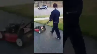 Michael Myers cuts his grass preparing for Halloween day