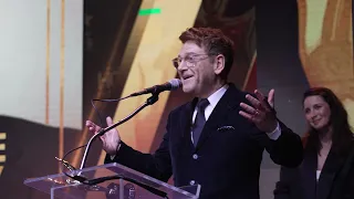 Kenneth Branagh accepts the Excellence in Artistry Award at the 5th Annual HCA Film Awards