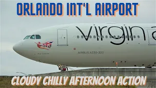 [4K] ORLANDO INT'L AIRPORT WINDY OVERCAST DAY UP-CLOSE PLANE SPOTTING MAX 8, A220, A330  2/05/22.