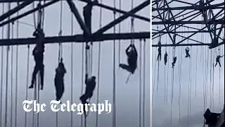 Workers left dangling after building collapse in Brazil