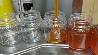 Jarring honey  in plastic bottles