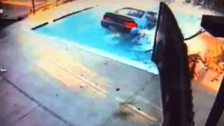 Woman Drives Car Into Swimming Pool