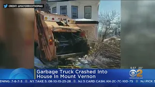 Garbage Truck Crashes Into Home