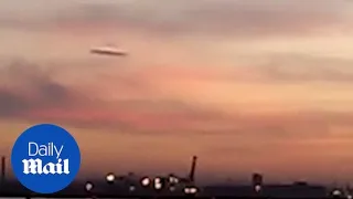 Footage shows UFO hovering in the clouds in Ukraine