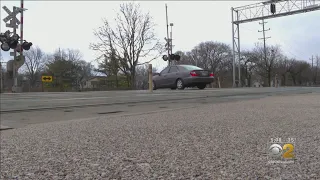 Railroad Crossing Gates Up Even As Trains Pass Through