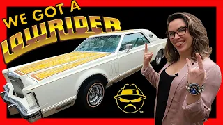 SHE BOUGHT A LOWRIDER! A 1977 Lincoln Continental Mark V on airbags.