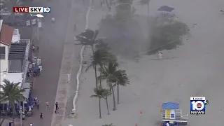 Waterspout hits Hollywood Beach, knocks over beachgoer