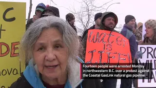 Protesters for and against pipelines chant outside Trudeau event