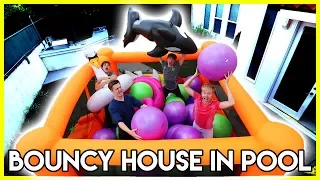 FILLING BOUNCY HOUSE WITH GIANT BALLS | (thrown in pool)