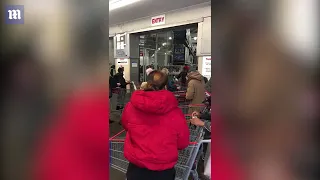 Customers sprayed with disinfectant as they enter Croydon Costco