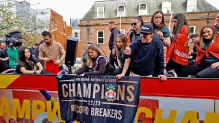 INCREDIBLE SCENES as Ryan Reynolds and Rob McElhenney celebrate Wrexham promotion with bus parade