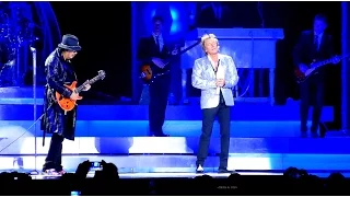 Carlos Santana and Rod Stewart