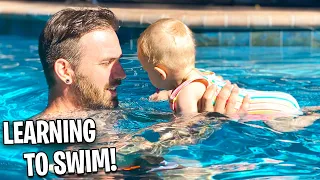 TEACHING MY BABY HOW TO SWIM!